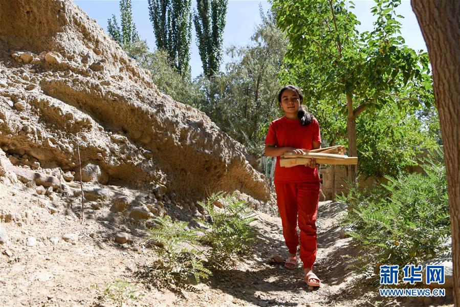 （決戰決勝脫貧攻堅·圖文互動）（5）拋在舊鄉的“火墻”——新疆易地扶貧搬遷安置點見聞