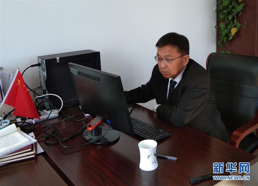 (愛國情 奮斗者·圖文互動)(1)“我對工作有一種情結”——記25年堅守一線的鶴崗基層法官孫波