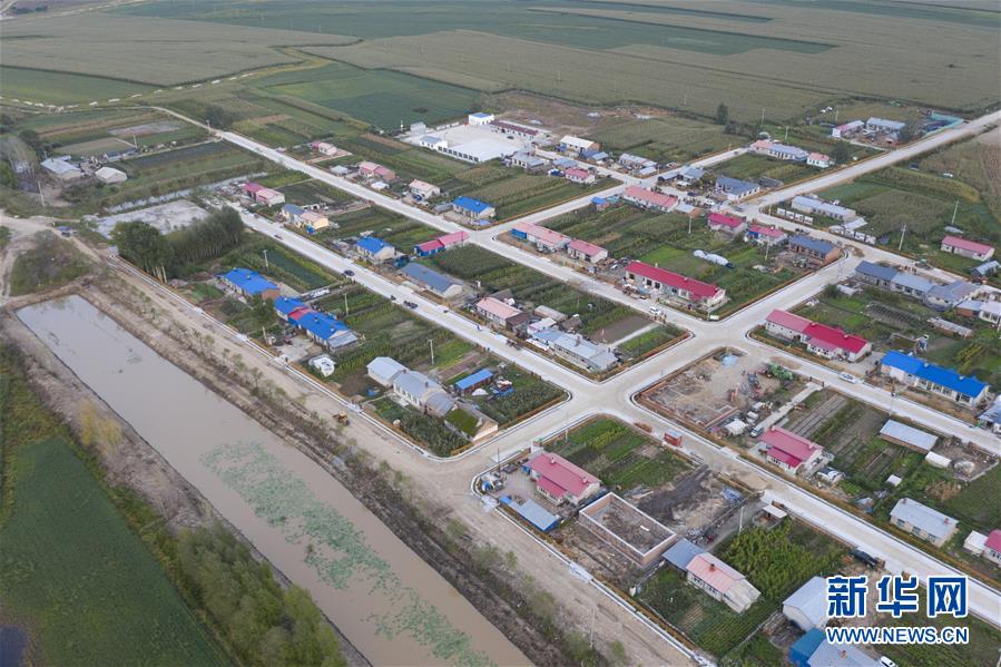 (決戰決勝脫貧攻堅·圖文互動)(1)團結村的李輝新傳