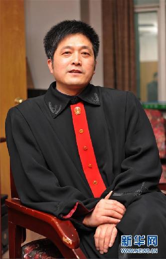 (圖文互動(dòng))其人如蘭,既潔且馨——追記“全國(guó)模范法官”胡國(guó)運(yùn)