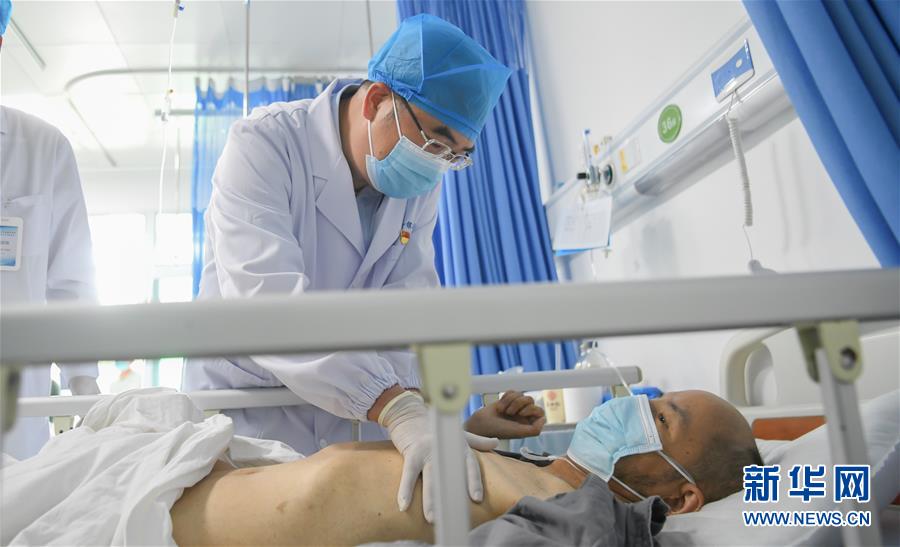 (抗疫先進事跡·圖文互動)(4)張定宇:疫情“暴風眼”里,“漸凍”之軀與時間賽跑