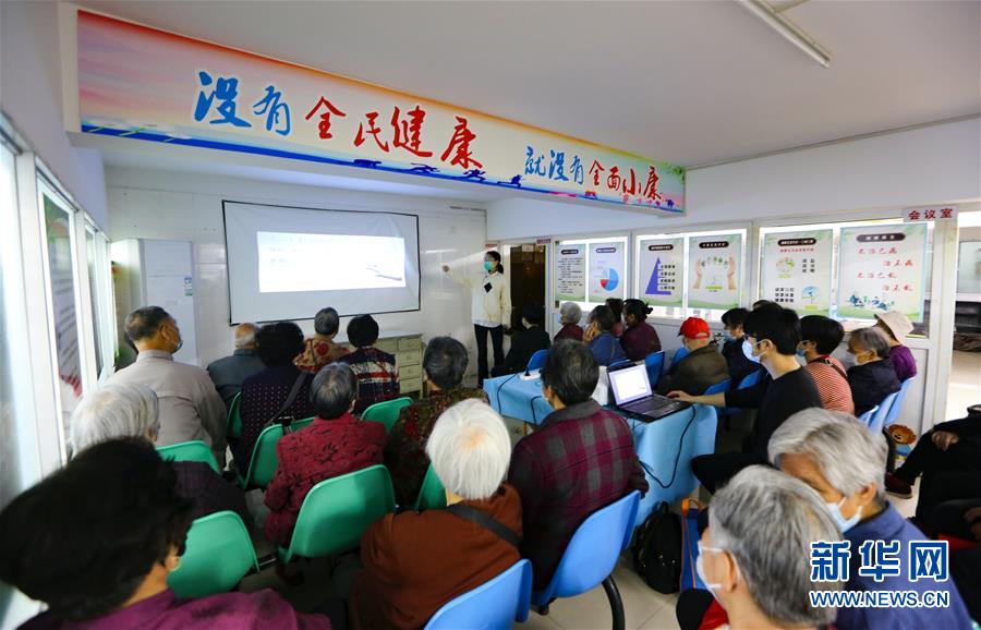 (新華全媒頭條·兩會精神看落實·圖文互動)(3)整體謀劃、系統升級、全面提升——落實全國兩會精神織牢織密公共衛生防護網