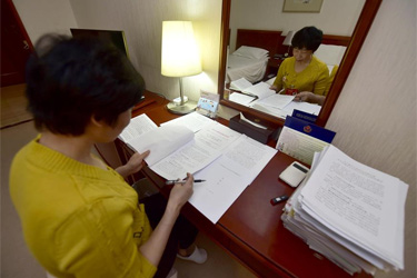 薛海英代表：關注農民工權益和城市環境