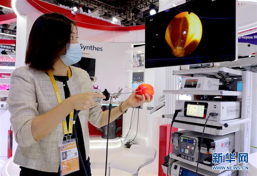 (第三屆進博會·圖文互動)(5)新疫苗、新療法,進博會最“火爆”展區見聞
